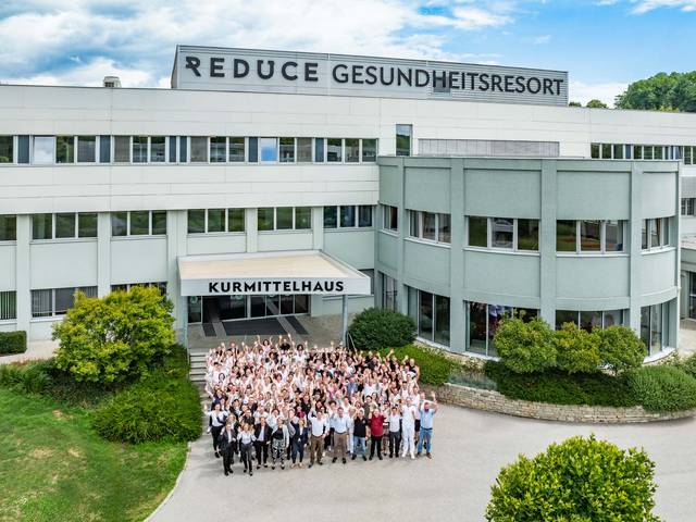 Drone shot in front of the Kurmittelhaus with the REDUCE team